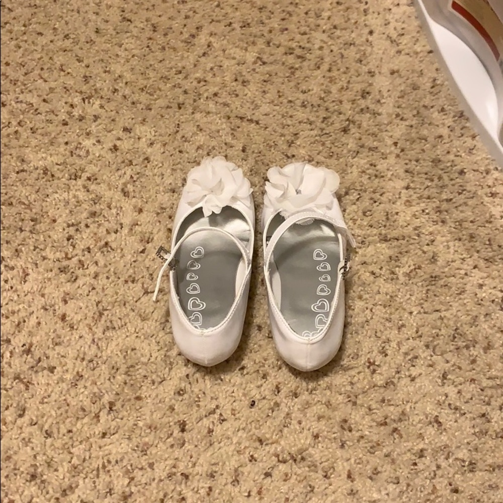 These are white high heeled shoes.